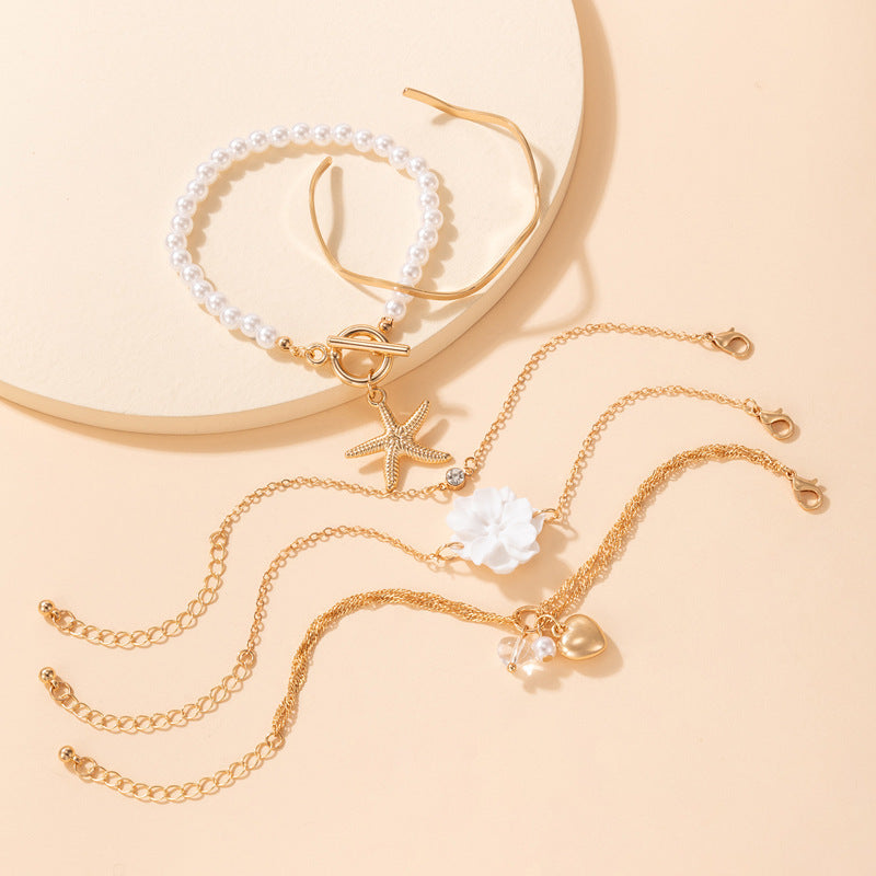 5-Piece White Flower & Starfish Pearl Bracelet Set – Summer Beach Jewelry for Women