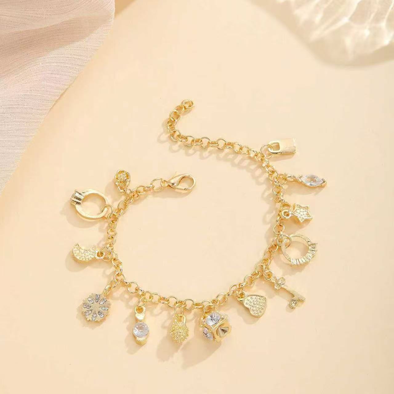 Boho Silver Plated Copper Charm Bracelet – Fashion Jewelry with 13 Unique Pendants, Trendy Multi-Element Design