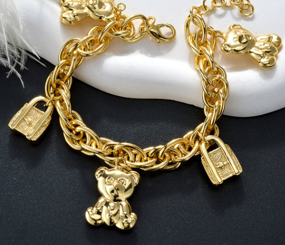 Gold-Tone Bear & Handbag Charm Bracelet – Elegant Copper Jewelry with Teddy Bear & Lock Pendants, Perfect Gift for Parties & Daily Wear