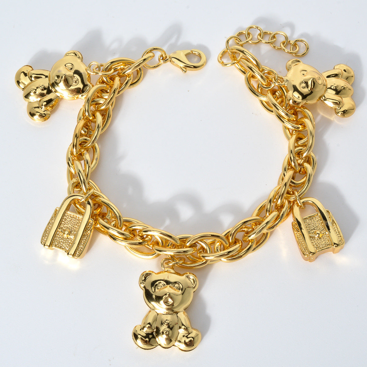 Gold-Tone Bear & Handbag Charm Bracelet – Elegant Copper Jewelry with Teddy Bear & Lock Pendants, Perfect Gift for Parties & Daily Wear